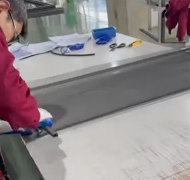 Insect Screen Assembly-Rolling the spline into the screen frame